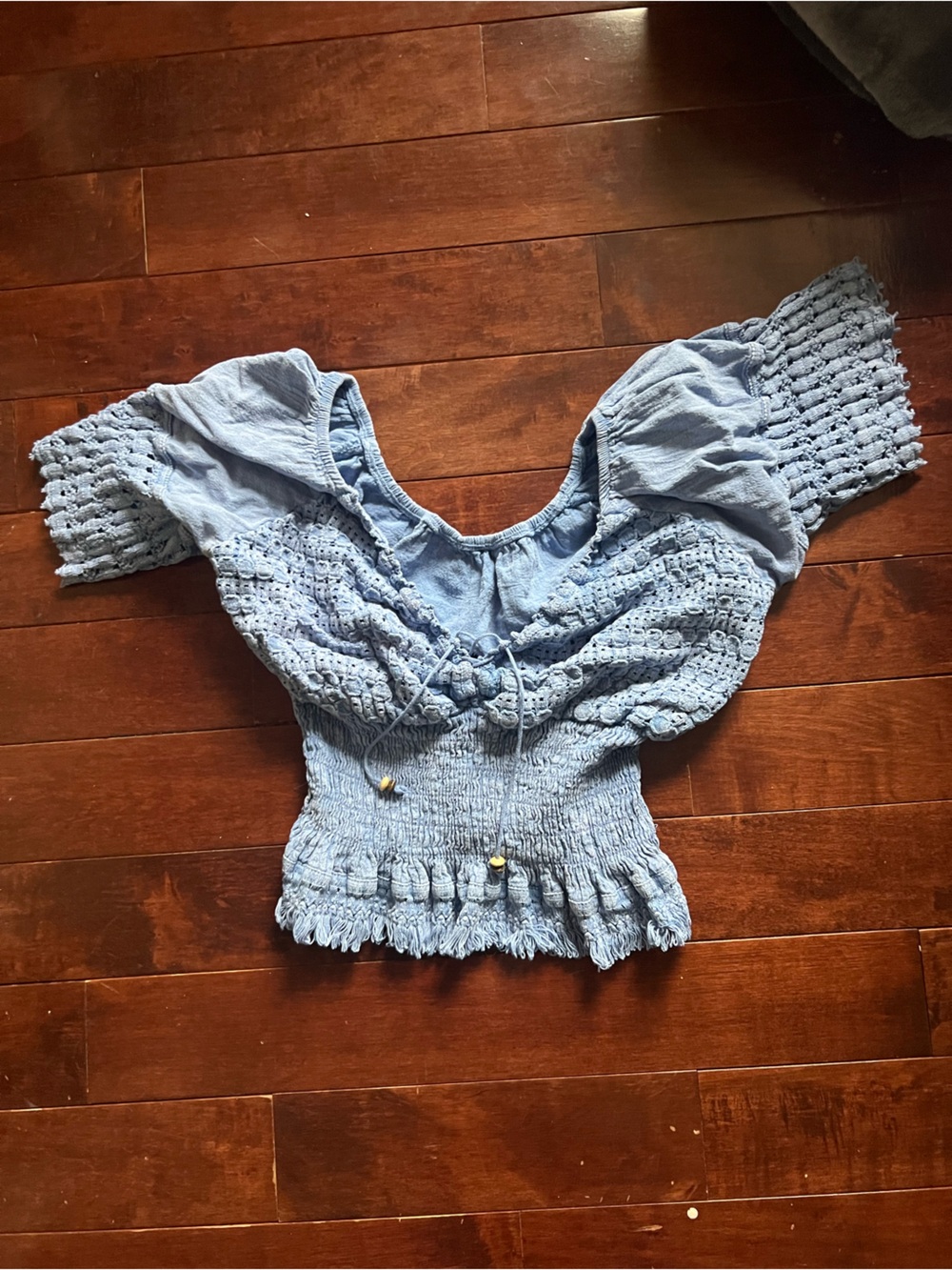 Light Blue top. I got this from a beach store in grand bend Ontario